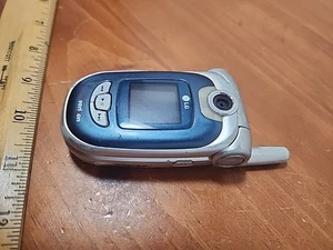 LG VX8100 - blu e argento (Verizon) raro telefono cellulare flip non testato leggere - Foto 1 di 13