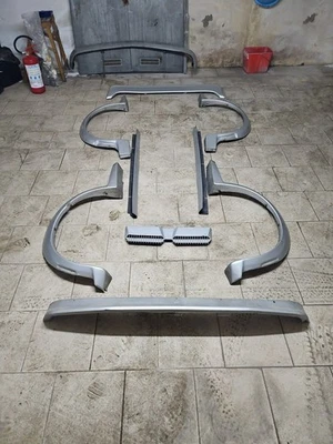 FORD ESCORT MK3 KIT ESTETICO PASSARUOTE ALETTONE - Imagen 1 de 4