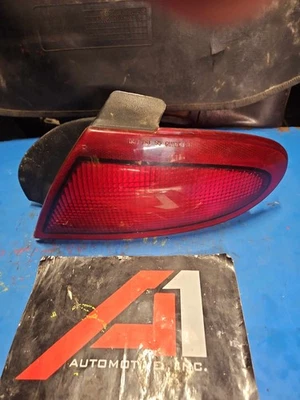 95-99 PONTIAC SUNFIRE Right Tail Light Quarter Panel Mount Passenger Side Rh OEM - Image 1 of 4