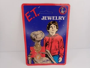 E.T. Orange Flower Charm Pendant Necklace Sealed New Old Stock 1982 - Picture 1 of 7