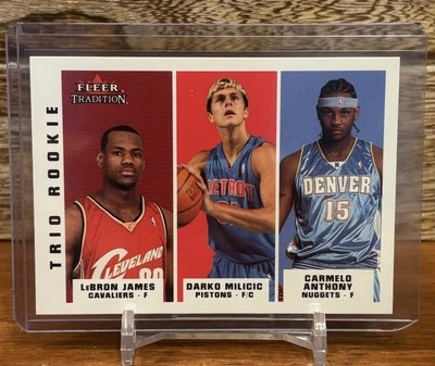 2003-04 Fleer Tradition Trio Novato LeBron James, Carmelo Anthony, Darko Milicic Foto 1 de 4