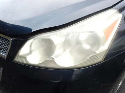 Faro halógeno izquierdo Chevrolet Traverse 09-12 sin haz proyector OEM Foto 1 de 2