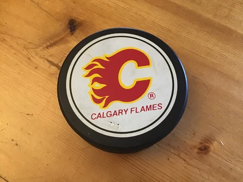 CALGARY FLAMES JOHN A. ZIEGLER GAME PUCK NHL VINTAGE - Canadian Seller Cover