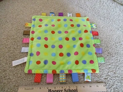 Manta de seguridad TaGgies verde naranja lunares etiquetas cintas encantadora suave bebé Foto 1 de 4