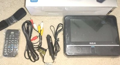 New RCA DRC6272 7"  Portable DVD Player w/ Remote, strap AV And power cord  - Image 1 of 2