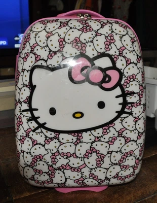 Equipaje de mano con ruedas rígido Sanrio Hello Kitty estampado de gatitos usado en excelente estado Foto 1 de 4
