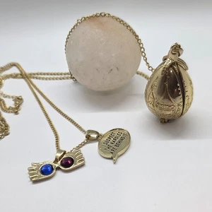 Lotto COLLANA Harry Potter Tri Mago Drago Uovo Luna Occhiali Nargles Pendente  - Foto 1 di 11
