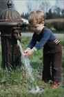 746001 Child With Working Victorian Village Water Pump England A4 Photo Print