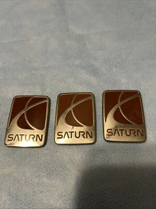 Saturn Emblems/plastic - Picture 1 of 2