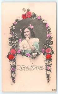 Postcard RPPC Amitie Sincere Pretty Girl in Rose Wreath Hand Tinted posted - Picture 1 of 3