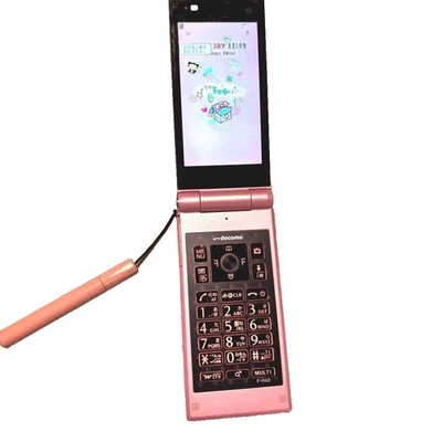 DOCOMO F-06D Telefono a ribalta rosa felice per ragazze Nicola Collab giappon... - Immagine 1 di 4