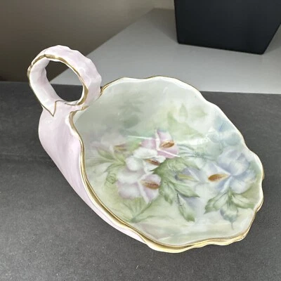 Porcelana vintage, cuchara con diseño de flor y adornos dorados firmada por A.J.Davis Foto 1 de 4