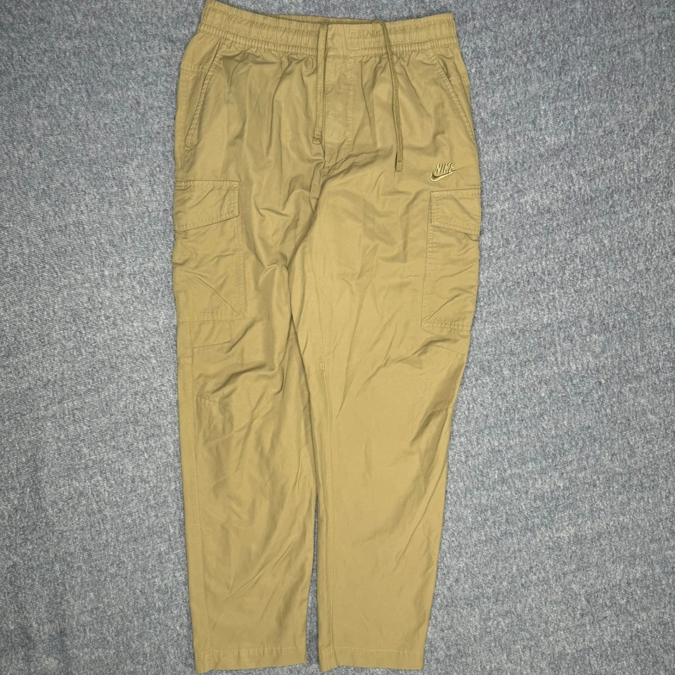 Pantalones de chándal cargo Nike para hombre tostados talla L con cordón bolsillos elásticos en la cintura Foto 1 de 4