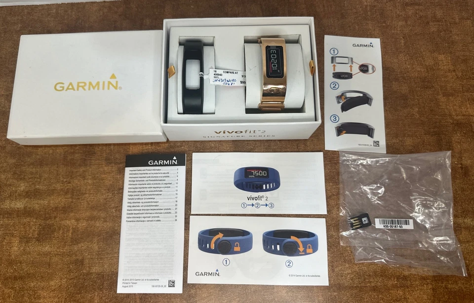 NUEVO Reloj Garmin Vivofit 2 Signature Series Dorado/Cuero y Negro Bandas RARO NUEVO EN CAJA - Imagen 1 de 4