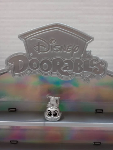 Disney Doorables Platinum Exclusive 100 years Cheshire Cat - Alice in Wonderland Cover