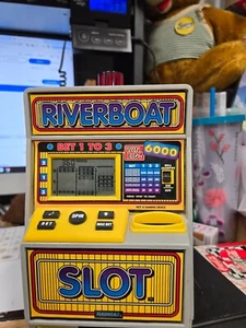 RADICA RIVERBOAT SLOT MACHINE BANK - Picture 1 of 4