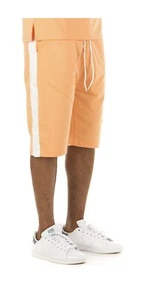 AKOO REGALLIA SHORTS NARANJA GASA TALLA MEDIANA NUEVO CON ETIQUETAS $79 - Imagen 1 de 11