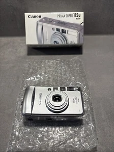 Canon Prima Super 115U Date Point and Shoot - Rarità da collezione New Old Stock - Foto 1 di 8