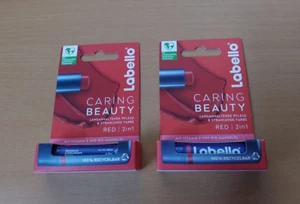2x Labello - Caring Beauty Red 2in1 - Lippenpflegestift mit Farbe - je 4,8g -NEU - Bild 1 von 2