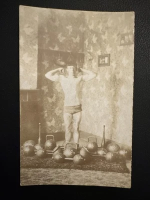 C 1915 RPPC Young Man Bodybuilder Strongman Iron Weights Bedroom Gym Muscle - Image 1 of 4