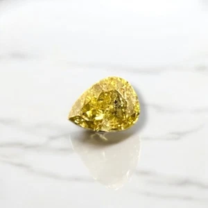 Diamante natural I1 color amarillo en forma de pera de 0,90 quilates claridad - 7,12 mm x 5,49 mm - Imagen 1 de 2