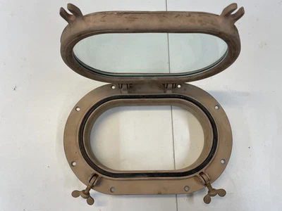 bronze opening port light 75 yr old oval glass about 5" X 9" good condition - Image 1 of 4