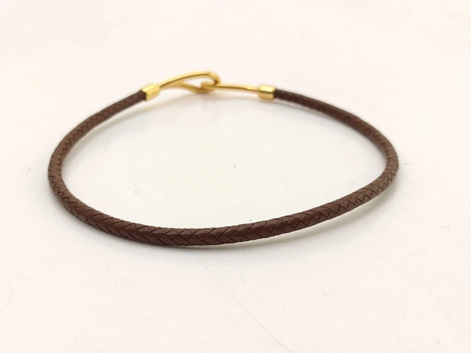 Gargantilla HERMES Jumbo de cuero marrón unisex trenzada con herrajes dorados Foto 1 de 4