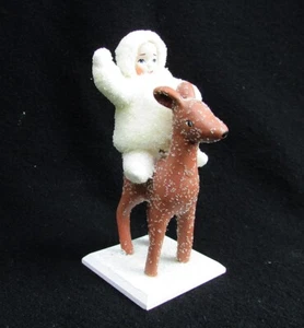 Snow Angels Department 56 Collection by Elaine Roesle, Girl Baby Sitting on Deer - Picture 1 of 6