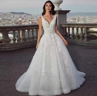 Vestido de novia con apliques de encaje sin espalda línea A espalda descubierta cuello en V vestidos de novia Foto 1 de 4