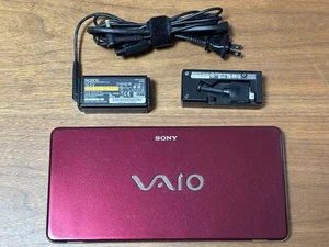 VGN-P70H SONY VAIO Type P Intel Atom Z520 1.33GHz HDD 60GB RAM 2GB Garnet red - Picture 1 of 12