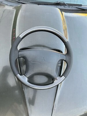 Volante en fibra de carbono real para Mitsubishi Eclipse Foto 1 de 4