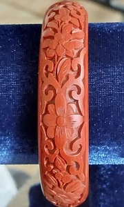 ANTIQUE CHINESE HAND CARVED FLORAL CINNABAR BANGLE BRACELET - Picture 1 of 8