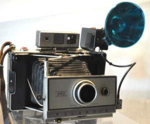 Fotocamera terrestre Polaroid modello 350 e pistola flash 268 - non testata. - Foto 1 di 8