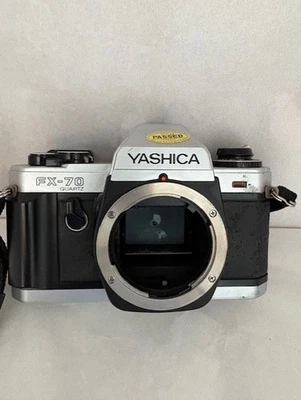 Cuerpo de cámara réflex de película de 35 mm de cuarzo Yashica FX-70 - solo cuerpo plateado - SIN PROBAR Foto 1 de 4