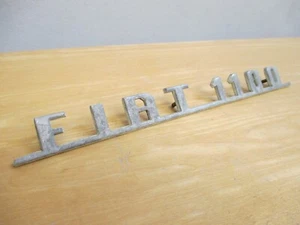 Emblema insignia maletero Fiat 1100 vintage *Picaduras* - Imagen 1 de 9