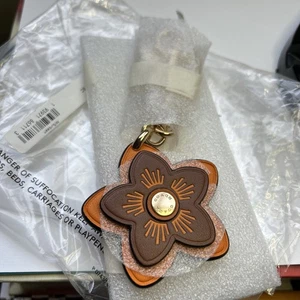 Neu mit Etikett Coach Wildflower Taschenanhänger Schlüsselanhänger Im/Sunbeam orange 1650 68 $ - Bild 1 von 6