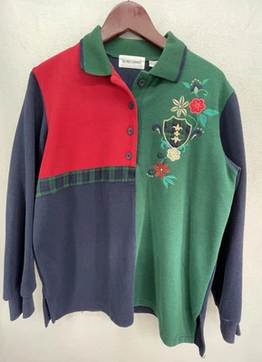 Sudadera De Colección Alfred Dunner Colorblock Cuello Bordado Flor Cresta Pequeña Foto 1 de 4