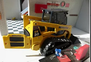 Escavatore cingolato compatto modello Joal 1:25 Komatsu CK30-1 nuovo con scatola 40084 metallo - Foto 1 di 5