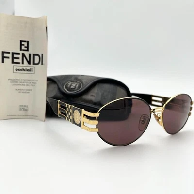 Gafas de sol FENDI SL7027 FF con logotipo de zucca doradas negras marrones marco circular vintage Foto 1 de 4