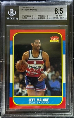 🔥 Fleer 1986-87 - Jeff Malone #67 (RC) - BGS 8,5 Foto 1 de 2
