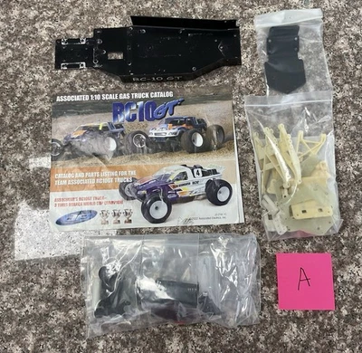Vintage Associated RC10 GT Nitro Parts Lot RC10GT Bulkhead Misc Lot A - Image 1 of 4