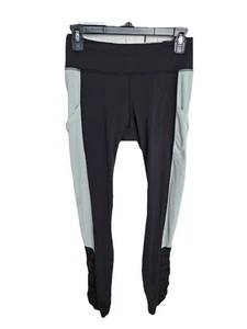 Lululemon Run: Get Up and Glow Leggings, schwarz/hell meerschaumgrün Gr. 6 - Bild 1 von 10