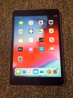 Ipad Mini 3 with Otterbox case - Image 1 of 4
