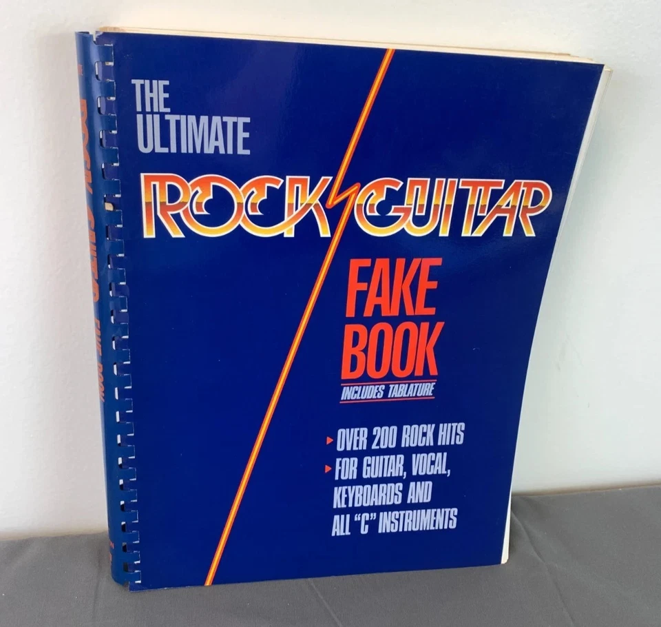 THE ULTIMATE ROCK GUITAR FAKE BOOK Includes Tablature, Hal Leonard, Spiral Bound - Image 1 of 1