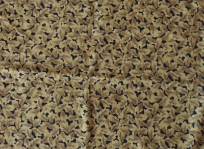 Tecido de Natal SPRINGS CREATIVE folhas verdes em solo preto 1/2 jarda - Imagem 1 de 2