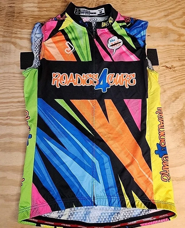 Camiseta deportiva sin mangas Jakroo Roadies Cure con logotipo de ciclismo cremallera completa para mujer mediana Foto 1 de 4