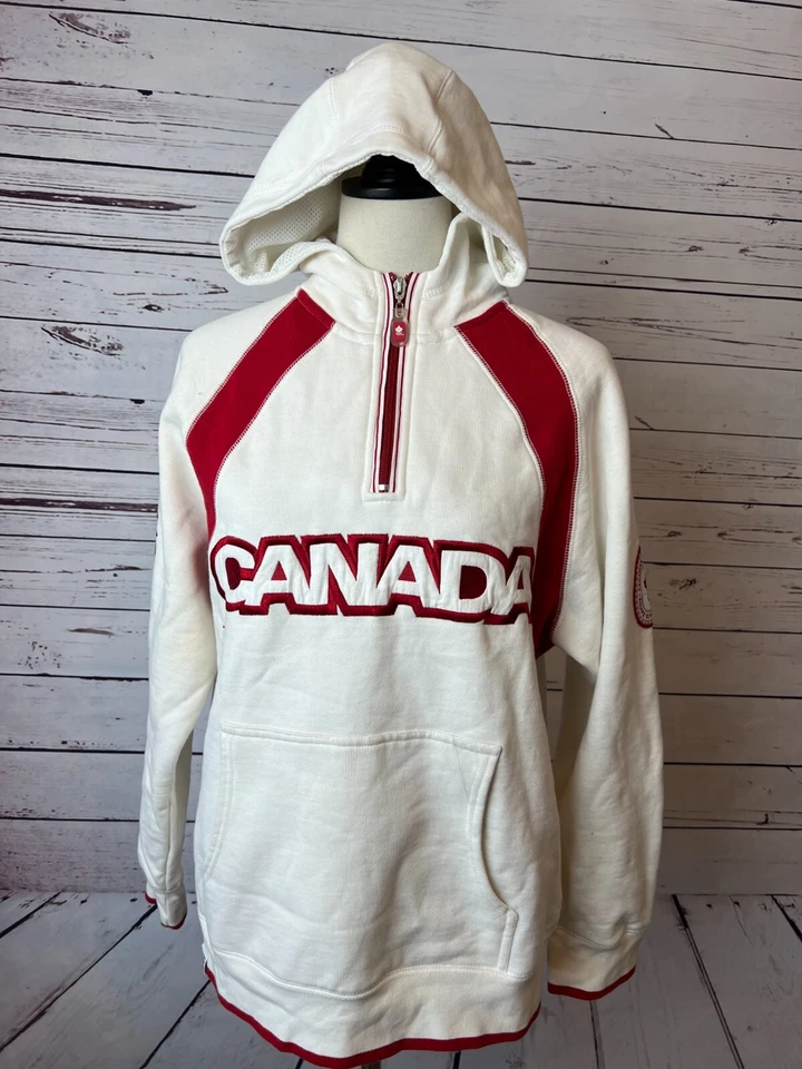 Equipo Canadá Olímpico HBC Sudadera con Capucha Mujer Pequeña Olimpiada Media Cremallera Sudadera Foto 1 de 4