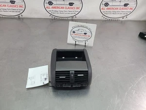 Pontiac G8 2008-09 consola de piso central delantera sección trasera con rejillas de ventilación - OEM - Imagen 1 de 24