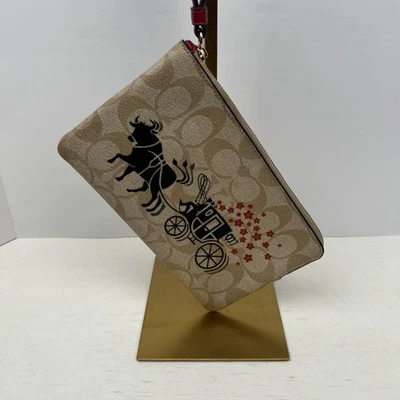 Coach Signature Canvas Horse and Carriage Wristlet Pouch Tan Red - Image 1 of 4