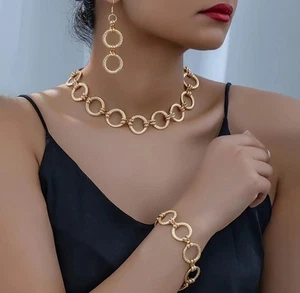 Collar, pulsera y pendientes círculo texturizado oro perforado 3 piezas - Imagen 1 de 4